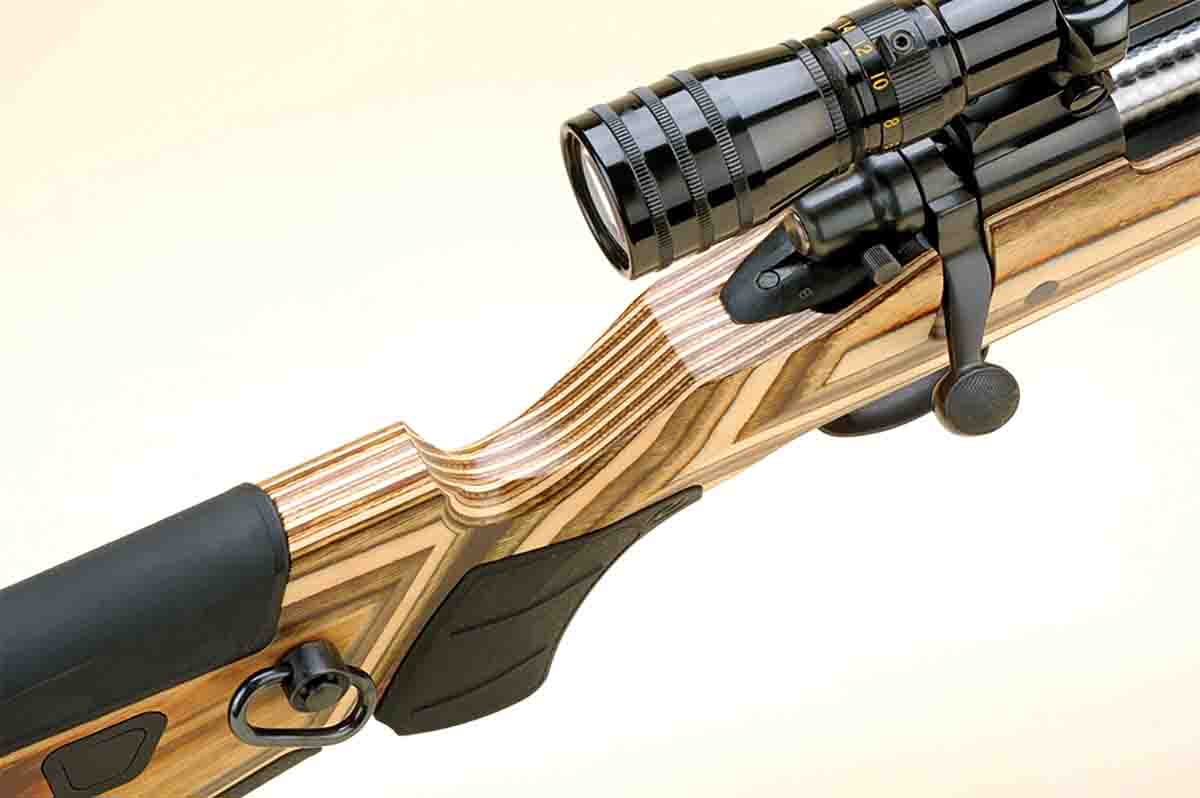 The top of the rifle showing the width of the stock, pistol grip insert and the convenient side sling swivel.